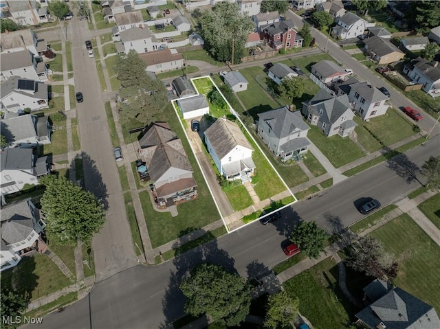 517 3rd St NW, New Philadelphia, OH 44663 - aerial overview of property's location featuring nearby suburban area and property boundaries highlighted