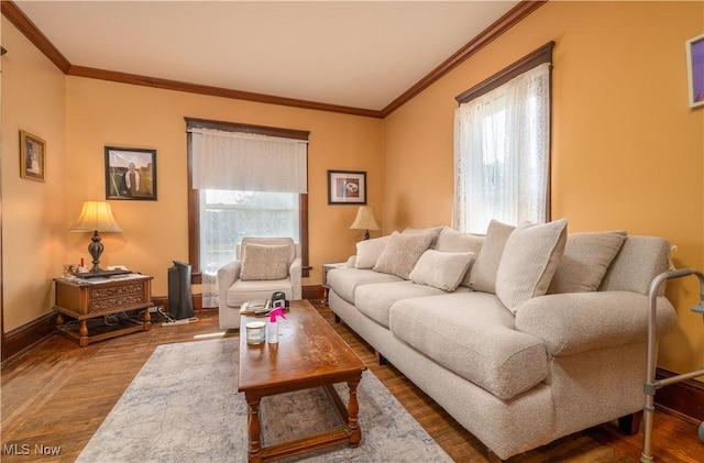 517 3rd St NW, New Philadelphia, OH 44663 - living room with wood finished floors, healthy amount of natural light, and crown molding