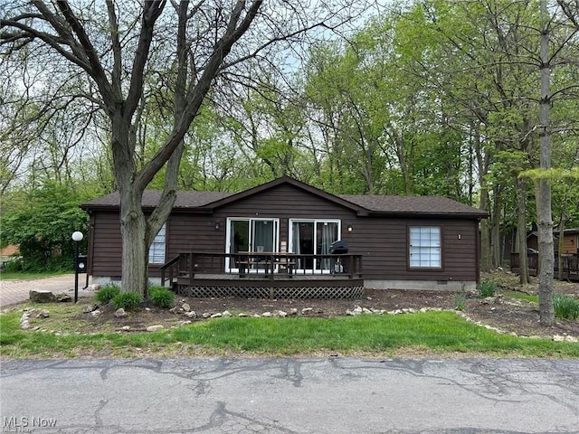 170 Sandcastle Dr, Put-In-Bay, OH 43456 - view of front of home featuring a wooden deck and crawl space
