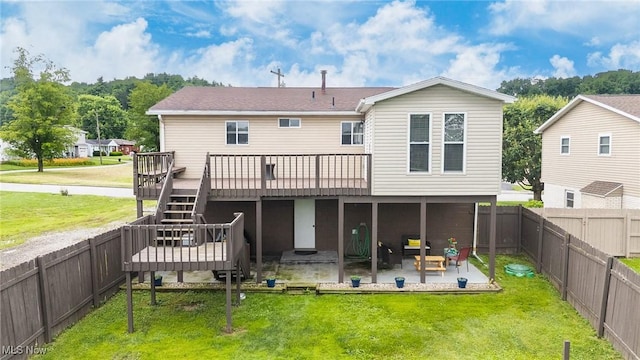 1902 26th Ave, Parkersburg, WV 26101 - rear view of house featuring a deck, a patio area, a fenced backyard, and stairs