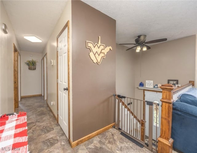 1902 26th Ave, Parkersburg, WV 26101 - stairs featuring a ceiling fan and a textured ceiling
