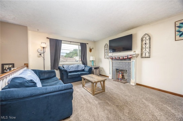 1902 26th Ave, Parkersburg, WV 26101 - living area with carpet, a textured ceiling, and a tiled fireplace