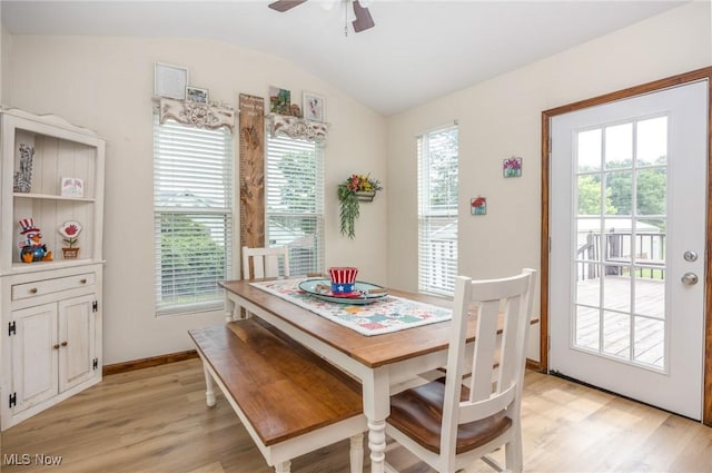1902 26th Ave, Parkersburg, WV 26101 - dining room featuring light wood-type flooring, vaulted ceiling, and a ceiling fan
