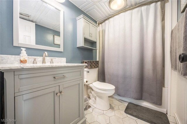 1902 26th Ave, Parkersburg, WV 26101 - bathroom featuring vanity, tile patterned floors, and shower / bath combo