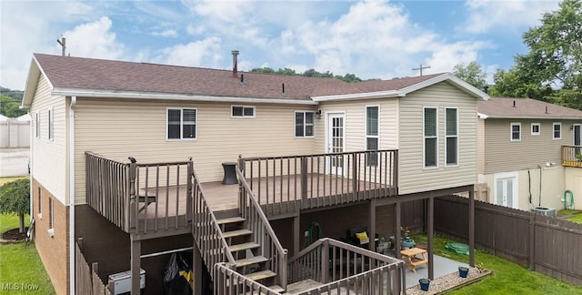 1902 26th Ave, Parkersburg, WV 26101 - rear view of house with a wooden deck, a fenced backyard, stairway, and a shingled roof