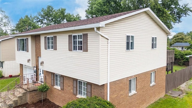 1902 26th Ave, Parkersburg, WV 26101 - view of property exterior with brick siding and a garage