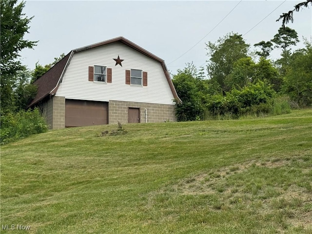 1281 Township Road 129, Adena, OH 43901 - view of side of home featuring a gambrel roof and a yard