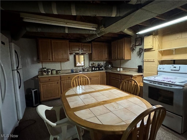 1281 Township Road 129, Adena, OH 43901 - kitchen featuring white appliances and light countertops