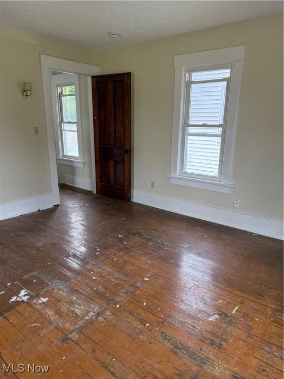 1225 Shorb Ave NW, Canton, OH 44703 - empty room with wood-type flooring and baseboards