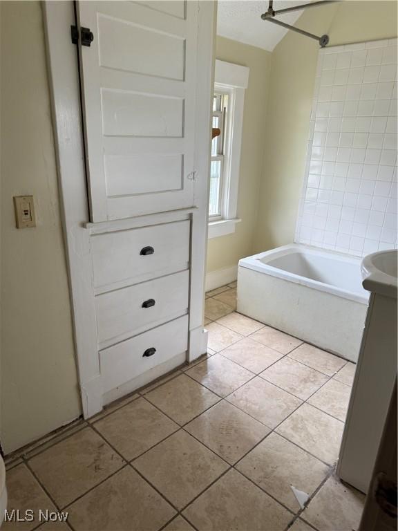 1225 Shorb Ave NW, Canton, OH 44703 - bathroom with tile patterned flooring and tub / shower combination