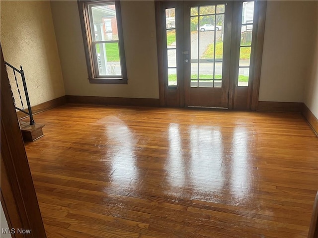 212 S 11th St, Cambridge, OH 43725 - unfurnished room with hardwood / wood-style floors and stairway