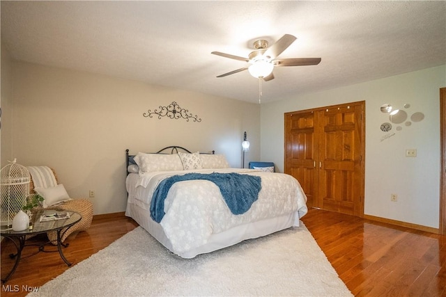5507 13th Ave, Vienna, WV 26105 - bedroom with wood finished floors, a closet, and a ceiling fan