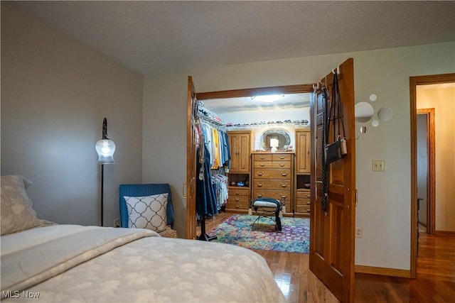 5507 13th Ave, Vienna, WV 26105 - bedroom featuring wood finished floors and a closet