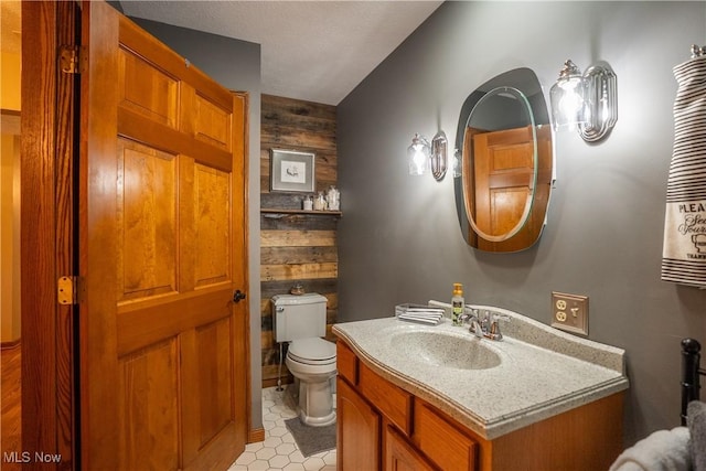 5507 13th Ave, Vienna, WV 26105 - bathroom featuring wood walls and vanity