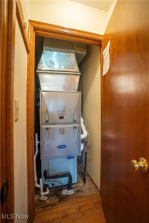 5507 13th Ave, Vienna, WV 26105 - detailed view of wood finished floors and heating unit