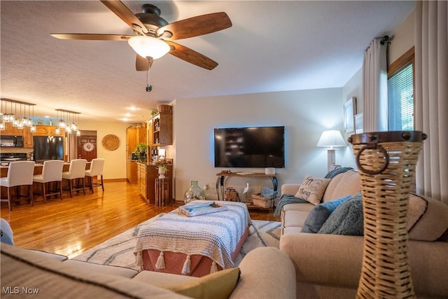 5507 13th Ave, Vienna, WV 26105 - living room with light wood-style floors and ceiling fan