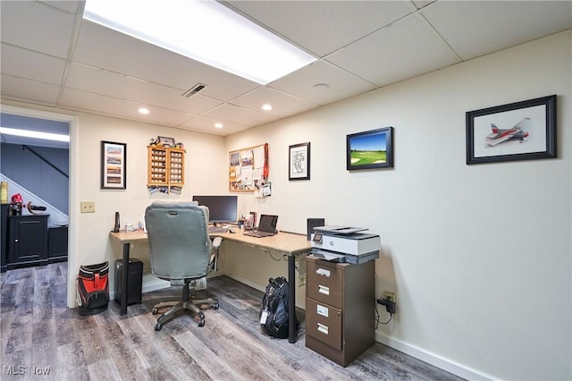 3145 Franks Rd, Clinton, OH 44216 - office with wood finished floors, a paneled ceiling, and recessed lighting