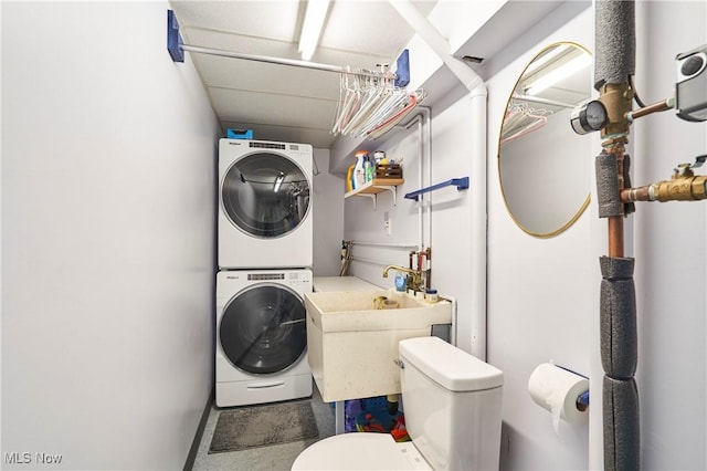 3145 Franks Rd, Clinton, OH 44216 - laundry room featuring estacked washer and dryer