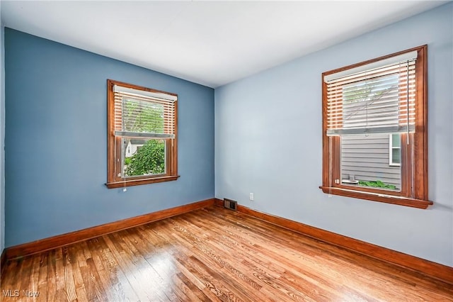 341 Kenmore Ave NE, Warren, OH 44483 - empty room with hardwood / wood-style flooring and baseboards