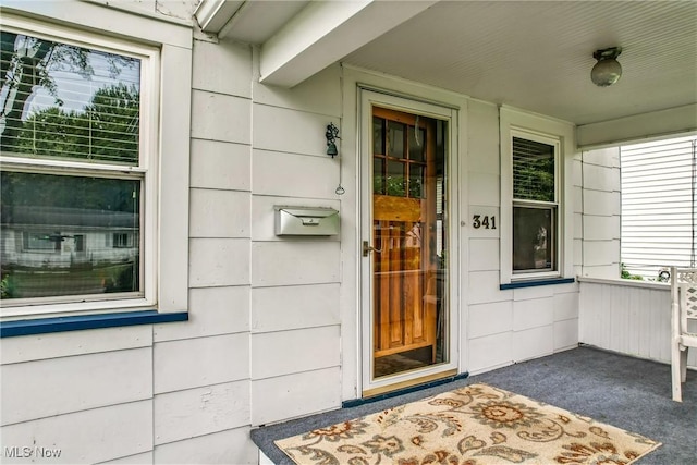 341 Kenmore Ave NE, Warren, OH 44483 - view of exterior entry featuring a porch
