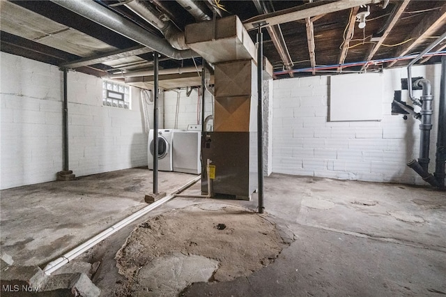 275 Fountain St, Akron, OH 44306 - below grade area featuring washing machine and clothes dryer and heating unit