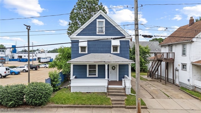 275 Fountain St, Akron, OH 44306 - american foursquare style home featuring stairs and a porch