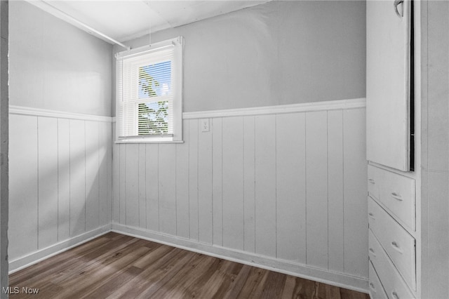 275 Fountain St, Akron, OH 44306 - empty room featuring dark wood-style floors and wainscoting