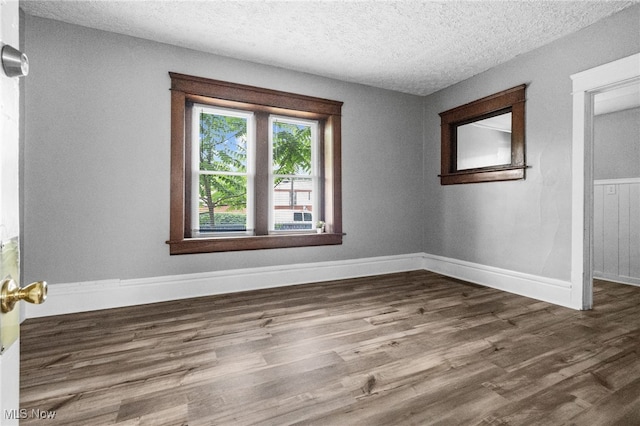 275 Fountain St, Akron, OH 44306 - unfurnished room with wood finished floors and a textured ceiling