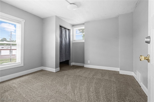 275 Fountain St, Akron, OH 44306 - unfurnished bedroom with carpet floors and a closet