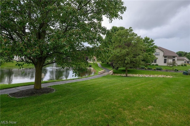 1011 Sequoia Dr NW, Strasburg, OH 44680 - view of grassy yard featuring a water view