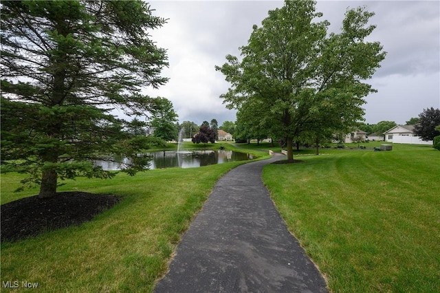 1011 Sequoia Dr NW, Strasburg, OH 44680 - view of property's community featuring a water view and a lawn