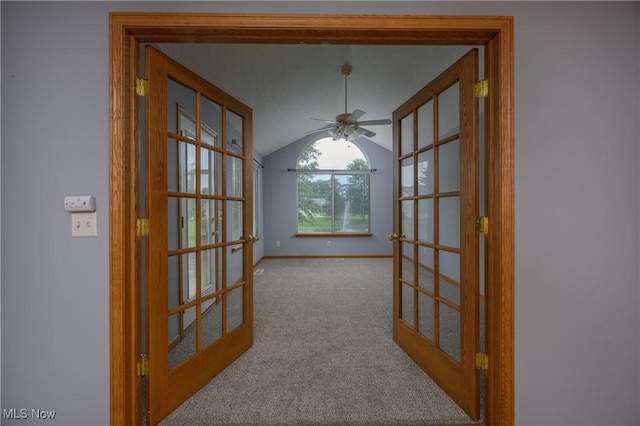 1011 Sequoia Dr NW, Strasburg, OH 44680 - hallway with french doors, carpet floors, and vaulted ceiling