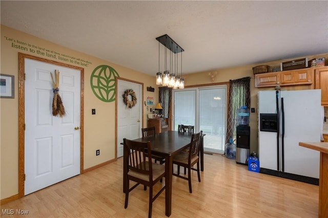 323 Mccook Ave, Dennison, OH 44621 - dining space featuring light wood-style floors
