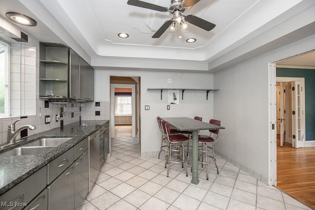 2611 Exeter Rd, Cleveland Heights, OH 44118 - kitchen with open shelves, gray cabinets, ceiling fan, tasteful backsplash, and recessed lighting