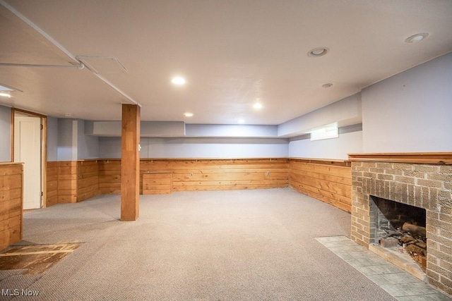 2611 Exeter Rd, Cleveland Heights, OH 44118 - finished below grade area with wood walls, a brick fireplace, carpet floors, and wainscoting