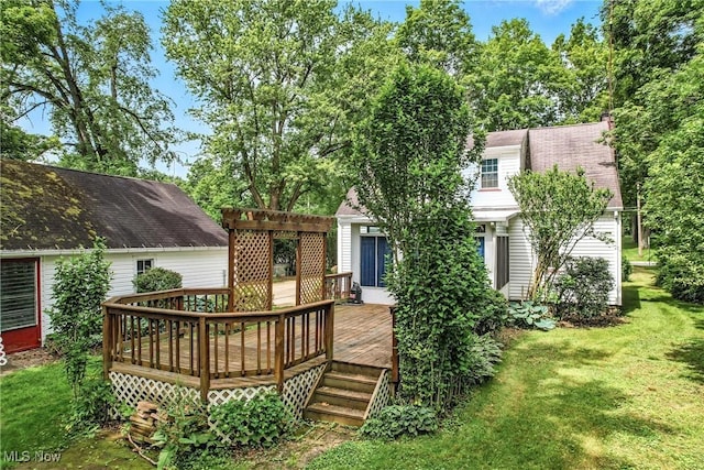6406 State Route 45, Bristolville, OH 44402 - back of property with a pergola, a wooden deck, a yard, and a shingled roof