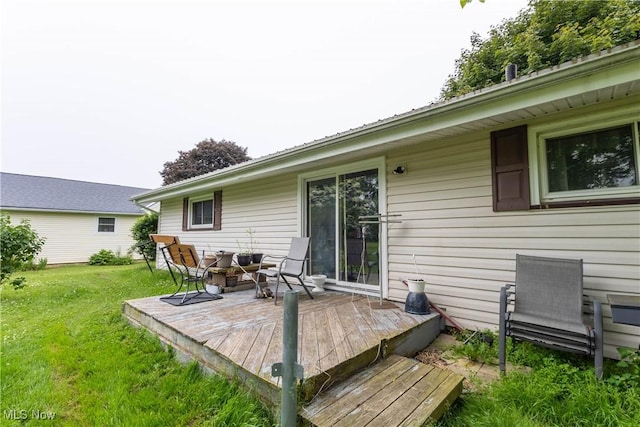 733 Lake Erie St, Conneaut, OH 44030 - wooden deck featuring a yard