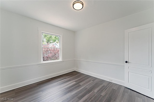 3414 Virginia Ave, Cleveland, OH 44109 - empty room featuring dark wood-style floors and baseboards