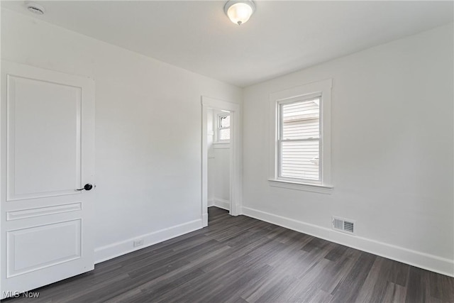 3414 Virginia Ave, Cleveland, OH 44109 - unfurnished room with dark wood-type flooring and a smoke detector