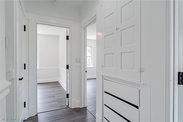 3414 Virginia Ave, Cleveland, OH 44109 - corridor featuring dark wood-type flooring and baseboards