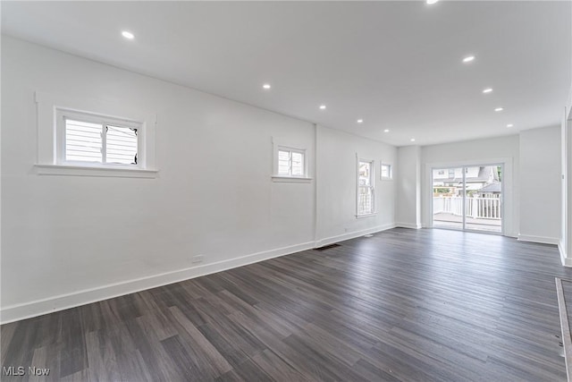 3414 Virginia Ave, Cleveland, OH 44109 - unfurnished room featuring dark wood-style floors and recessed lighting