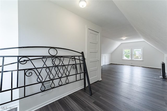 3414 Virginia Ave, Cleveland, OH 44109 - unfurnished bedroom with dark wood-type flooring and vaulted ceiling