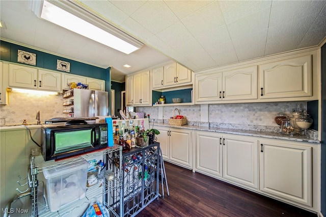 98 W Walnut St, Jefferson, OH 44047 - kitchen featuring black microwave, freestanding refrigerator, open shelves, dark wood-style flooring, and tasteful backsplash