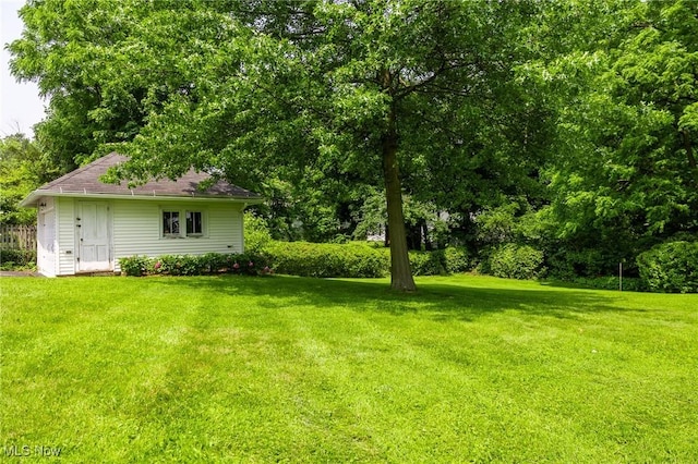 1237 Center St, Ashland, OH 44805 - view of grassy yard featuring an outbuilding