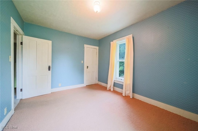 1237 Center St, Ashland, OH 44805 - unfurnished bedroom featuring carpet floors and baseboards