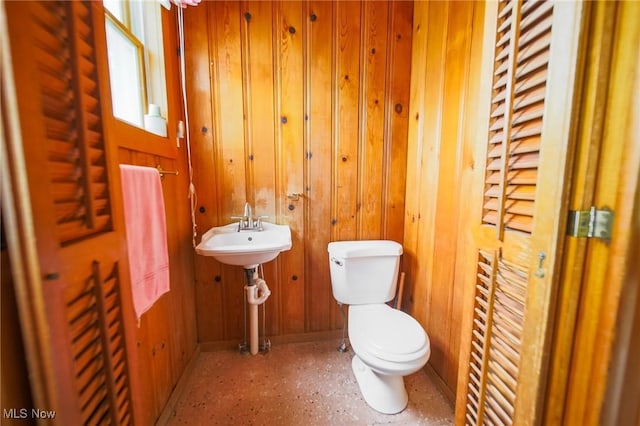 1237 Center St, Ashland, OH 44805 - half bathroom with toilet and wood walls