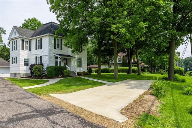 1237 Center St, Ashland, OH 44805 - view of front of property featuring a front lawn
