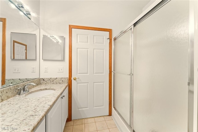 9151 Springfield Rd Unit 1603, Poland, OH 44514 - bathroom with a shower with shower door, vanity, and tile patterned flooring