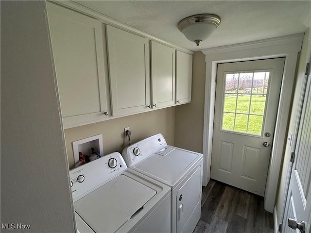 10545 Main St, Norwich, OH 43767 - washroom with cabinet space, separate washer and dryer, and dark wood-style floors