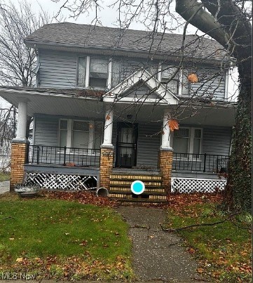 11611 Thornwood Ave, Cleveland, OH 44108 - view of front of home with a porch and roof with shingles